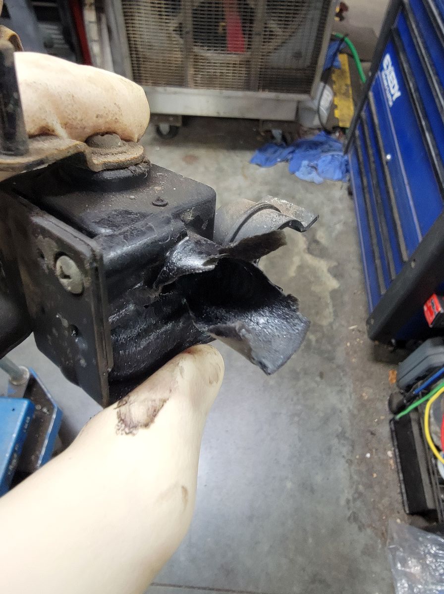 Melted and destroyed heater valve housing from a 2005 Honda Element