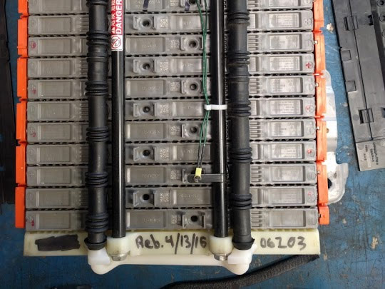 A failed reconditioned hybrid battery, dated in marker by whoever rebuilt it